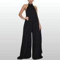 Saga – Svart Halterneck Jumpsuit i Flödande Design